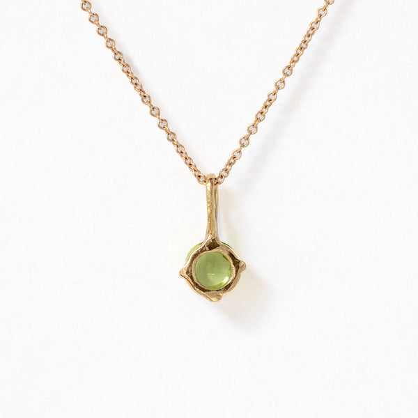 Round peridot necklace in 14k gold