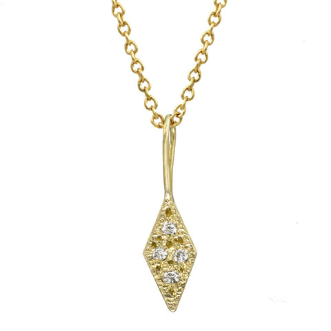 Trapezoid diamond pendant with bezel diamonds on a gold chain necklace.