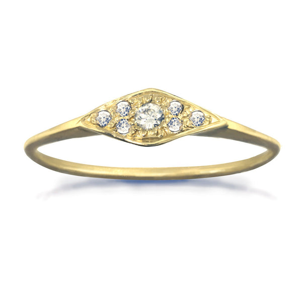 Horizontal geometric ring with small white diamonds in gold.