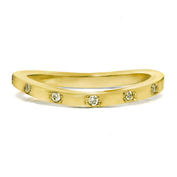 Gold ring with bezeled diamonds. Perfect for a wedding ring.