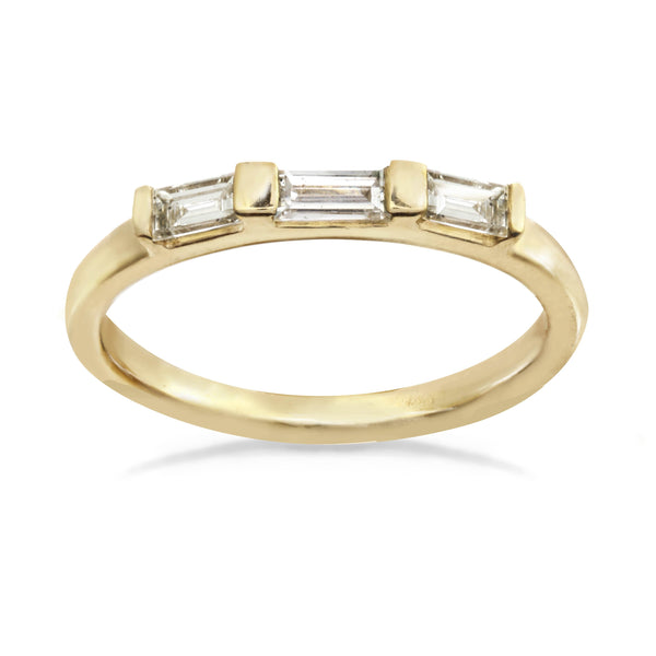 Three rectangle baguette diamonds on a 14k gold band