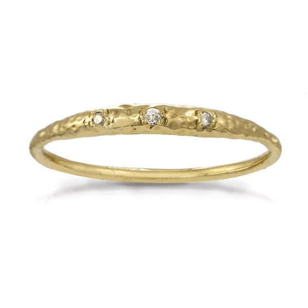 Thin gold band with a diamond crescent moon shape in front.