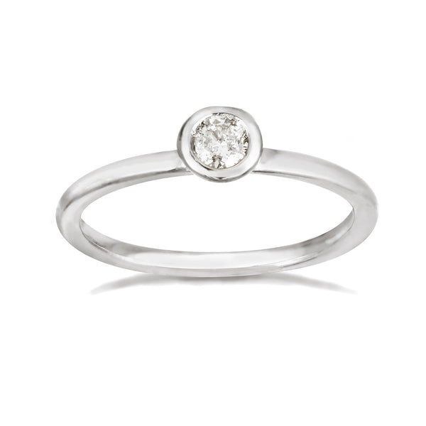 White gold engagement band with a solitaire white diamond. 