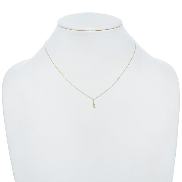 Diamond geometric necklace on a gold chain
