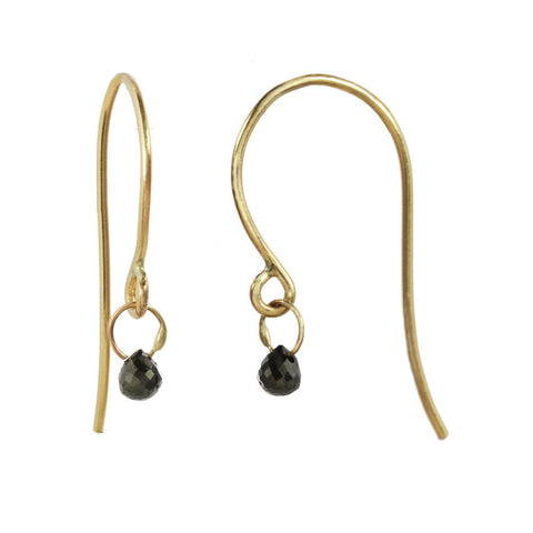 Tiny Constellation drop earring with small black diamond on a yellow gold fishhook.
